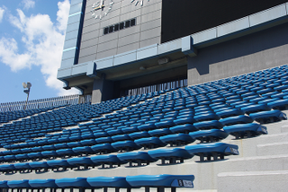 Illustration for article titled Seats From Tokyo's Demolished Olympic Stadium Sold As Minimalist Chairs